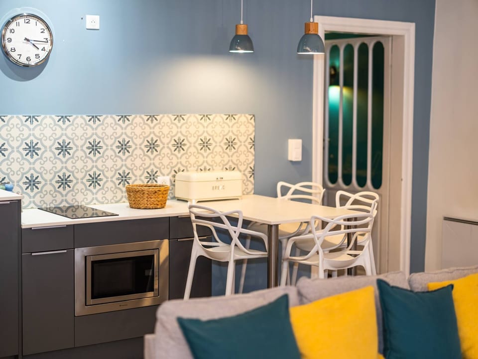 1st floor - Fully equipped kitchen - Crockery and cutlery - Tassimo coffee maker - Kettle - Induction hob - Household linen - Tea and herbal tea capsules available - Dining area.