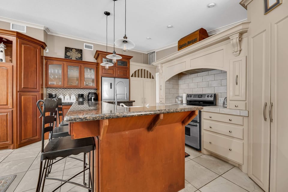 Cook with room to spread out on granite counters and an island bar