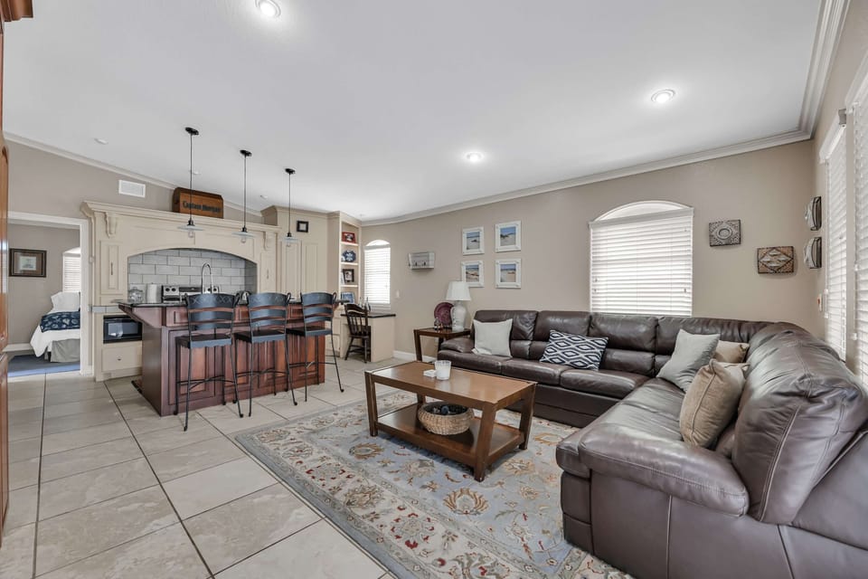 Settle into an open living space that flows from kitchen to couch