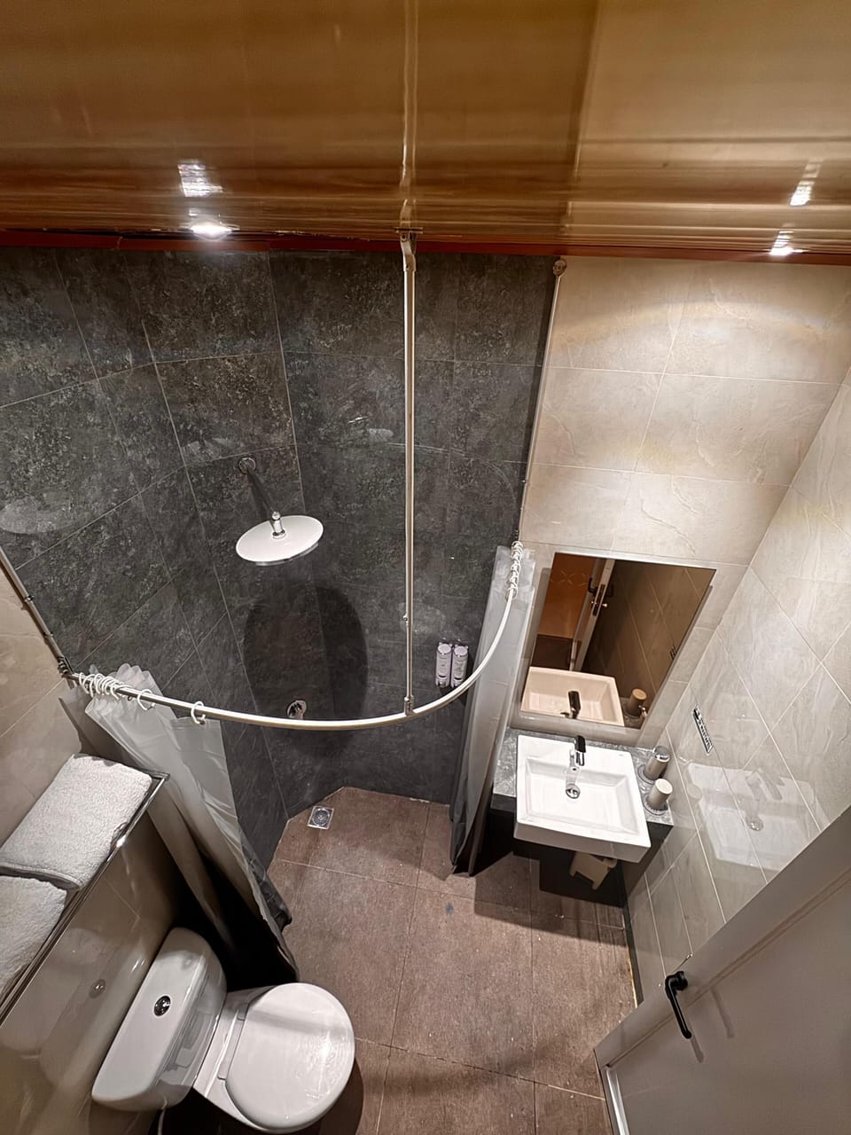 Shower, slippers, bidet, towels