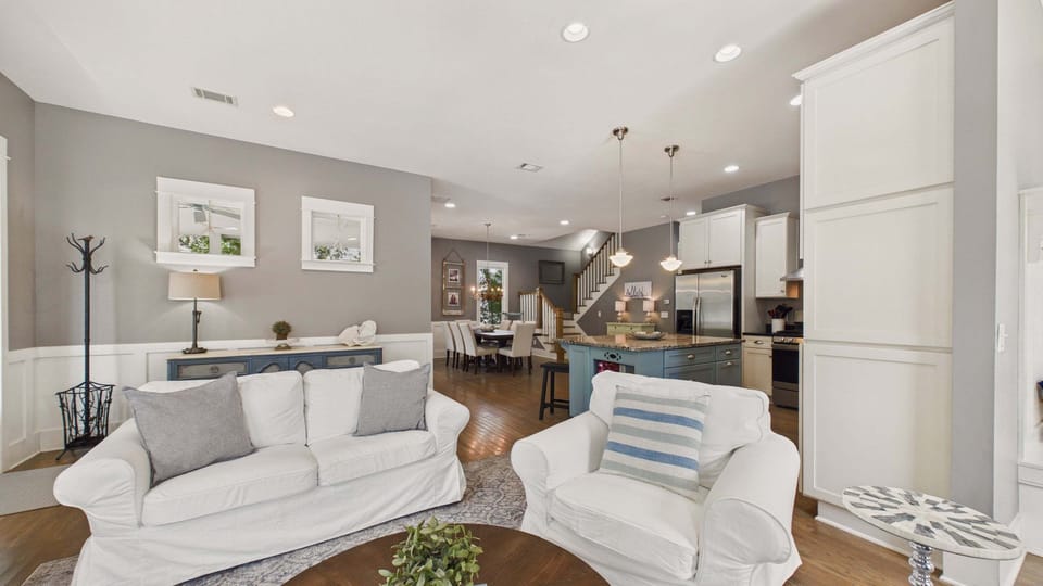 Living area with stylish furnishings that allow for ample seating. Sleeper sofa in the living area. TV included.