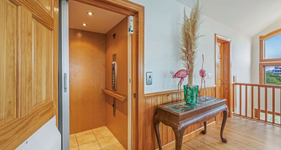 Surf or Sound Realty - 1202 - Parrot Pointe - Elevator - Label