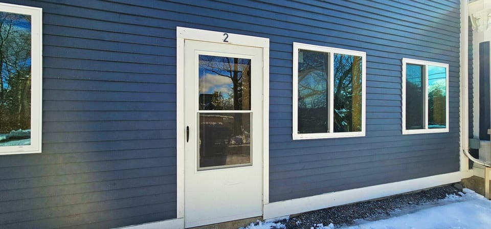 Private ground-level entrance with convenient access, dedicated parking nearby, and easy entry to your comfortable Greenville getaway.