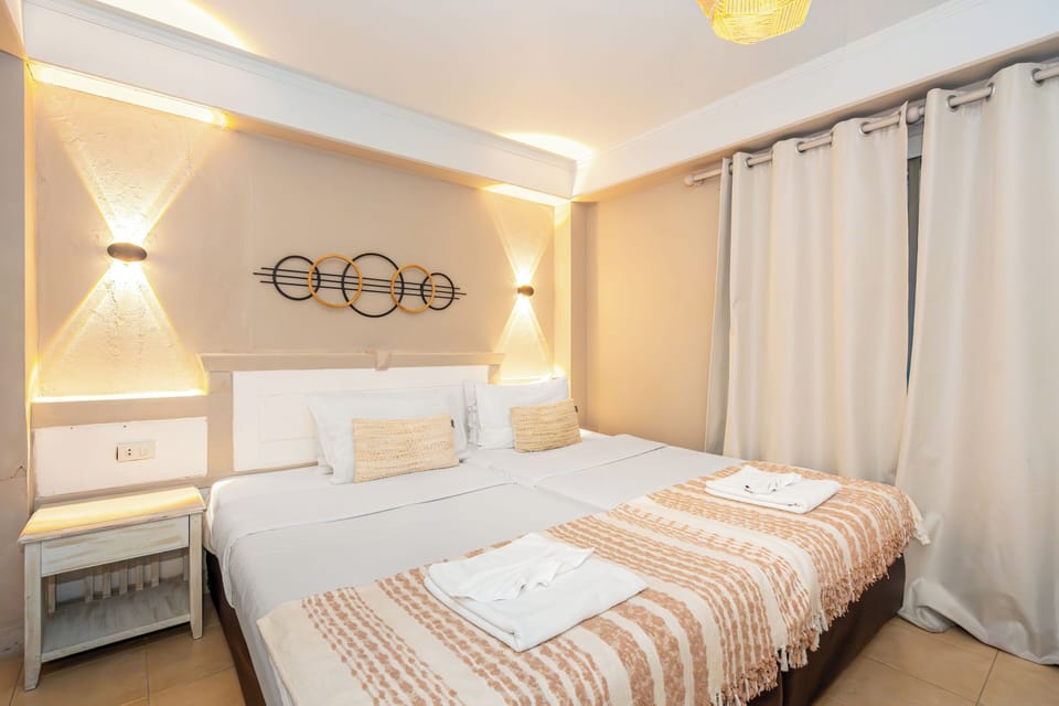 Deluxe Triple Room | Egyptian cotton sheets, premium bedding, memory foam beds, minibar