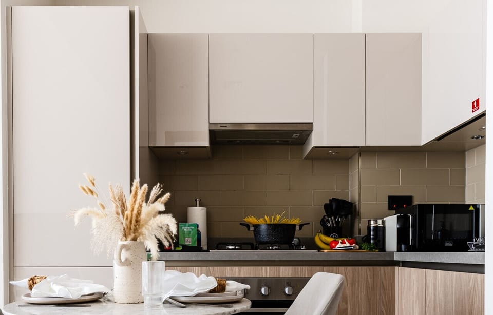Elegant dining area with a seamless view of the modern kitchen