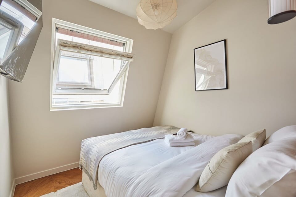 Apartment | Laptop workspace, iron/ironing board, bed sheets