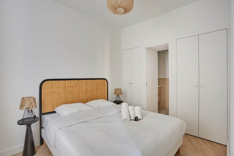 Apartment | Laptop workspace, iron/ironing board, bed sheets