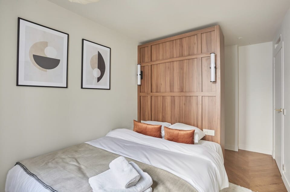 Apartment | Laptop workspace, iron/ironing board, bed sheets