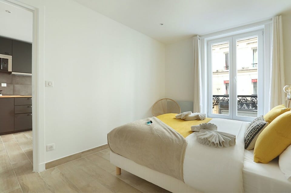 Apartment | Laptop workspace, iron/ironing board, bed sheets
