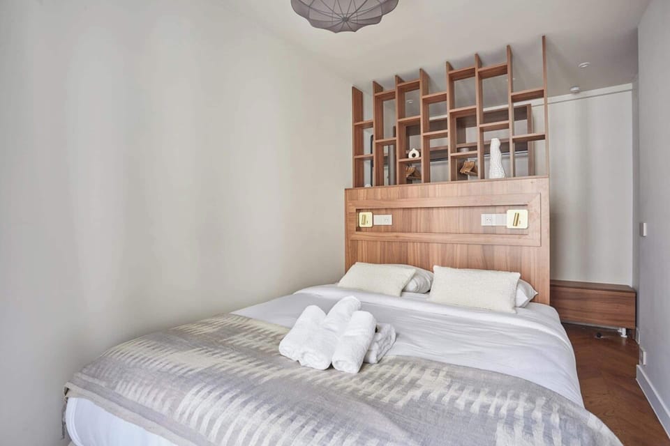 Apartment | Laptop workspace, iron/ironing board, bed sheets