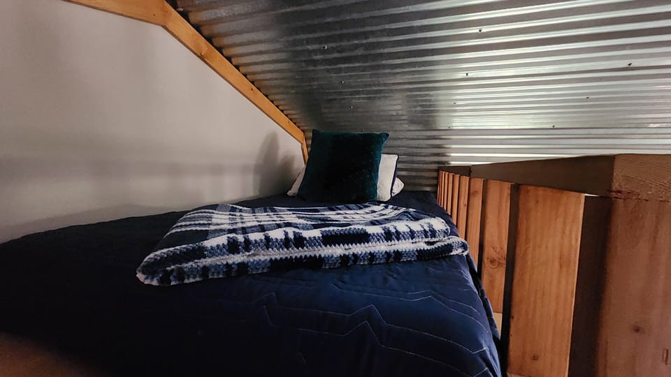Twin loft bed area