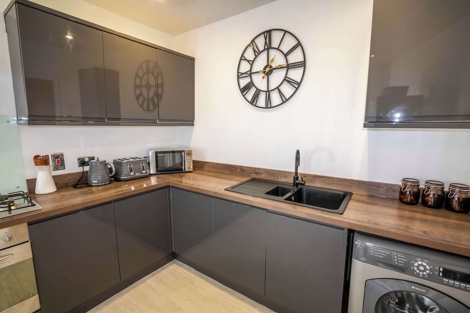 Washer included so you can pack light, plus plenty of worktop space for meal prep