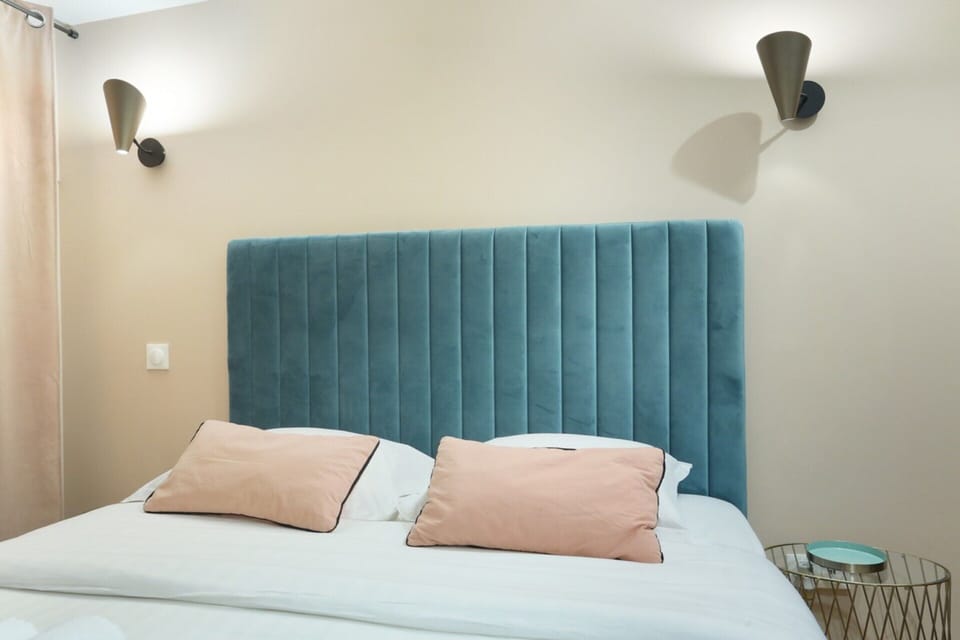 Apartment | Laptop workspace, iron/ironing board, bed sheets