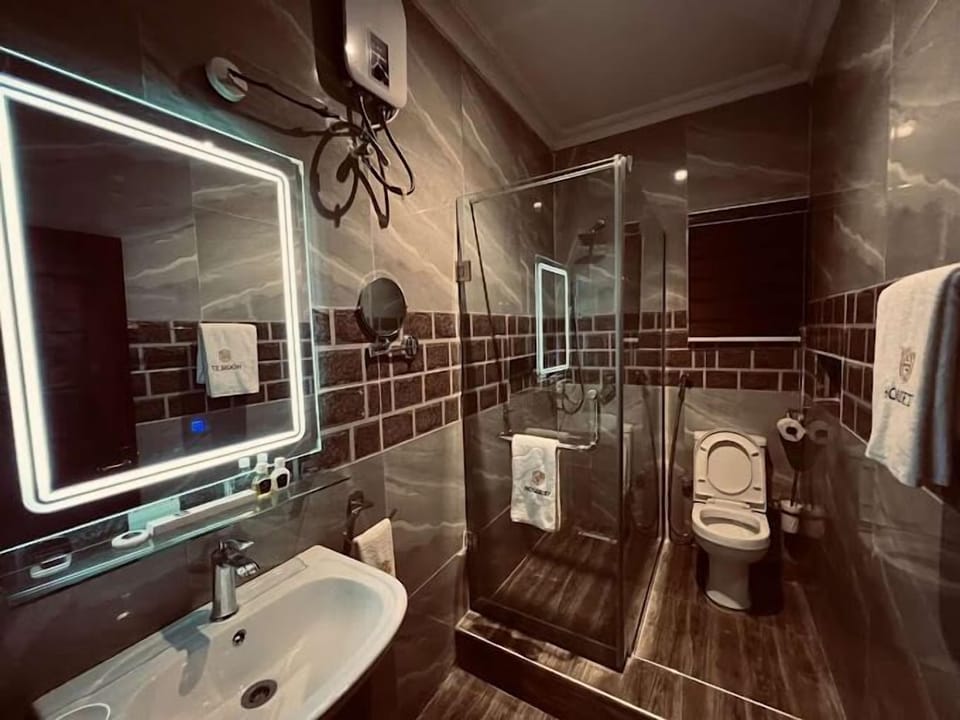 Economy Room, Balcony, City View | Bathroom | Free toiletries, hair dryer, towels, soap