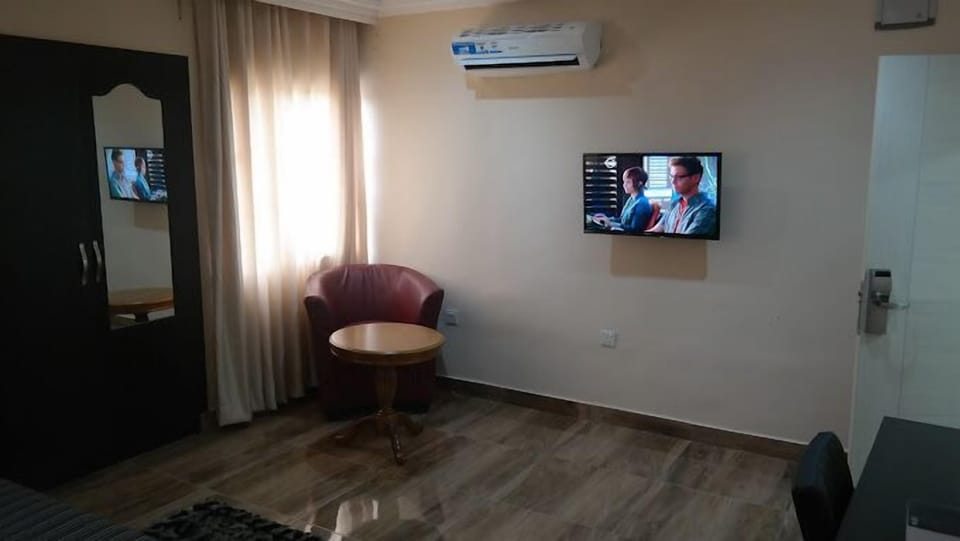 Family Apartment, Balcony, City View | 2 bedrooms, in-room safe, desk, laptop workspace