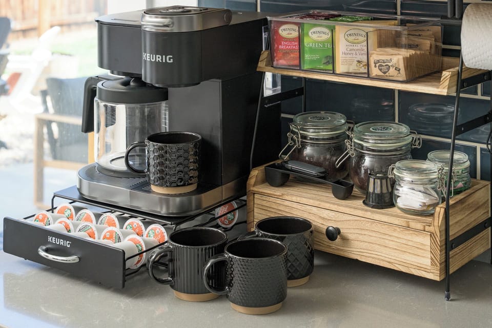 Main level coffee bar stocked with regular+ decaf Starbucks coffee and teas