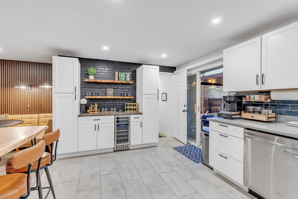 Main level Kitchen/bar area conveniently located near the back yard 