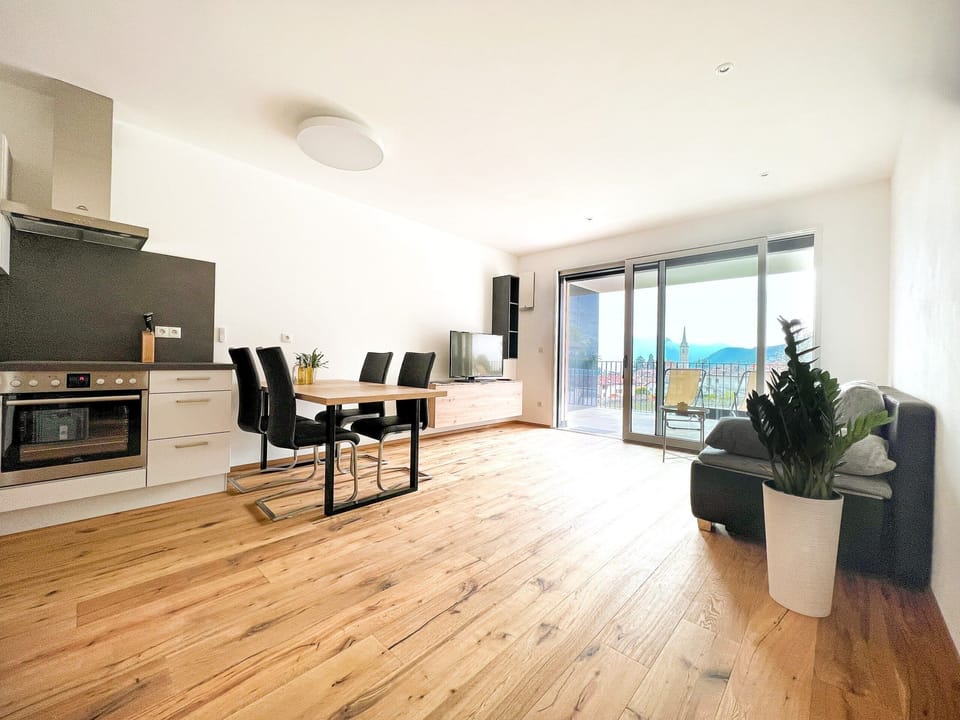 Living area with sofa and dining space
