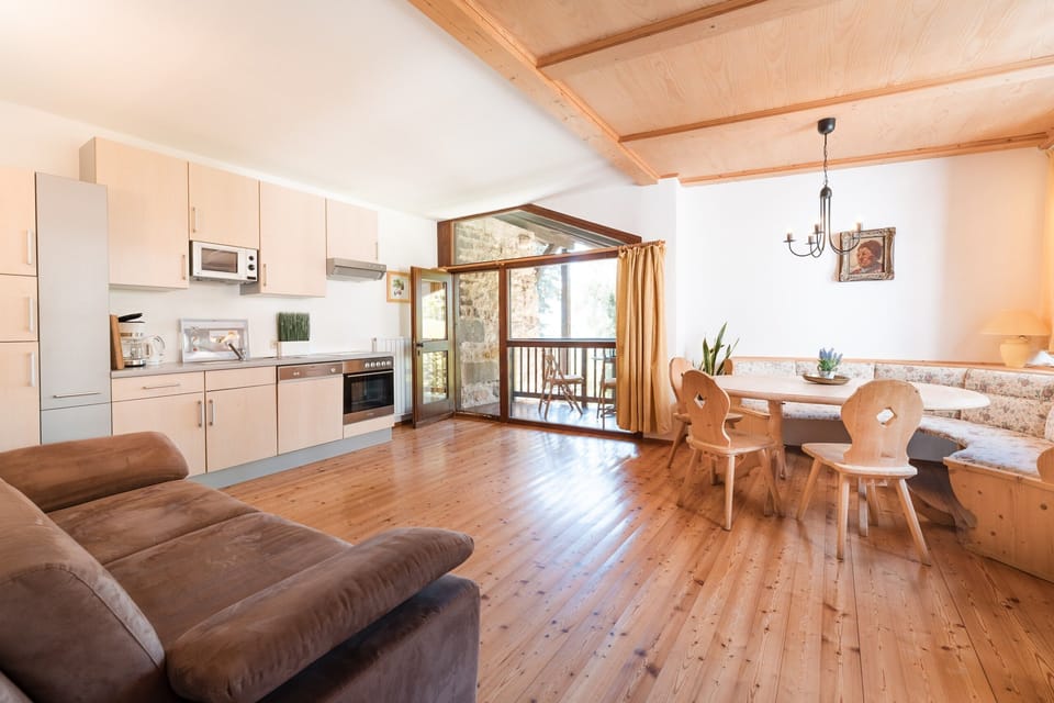 Living area under the old roof beams