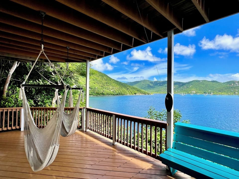 Downstairs balcony with sitting hammocks