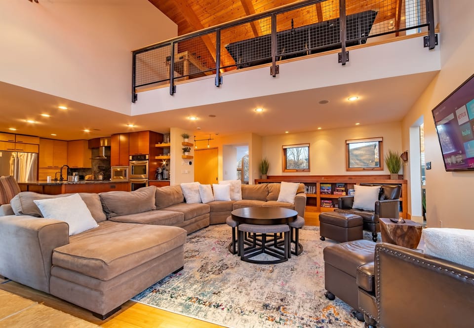 Gather in this expansive living area with your family and friends. Enjoy bamboo heated floors
