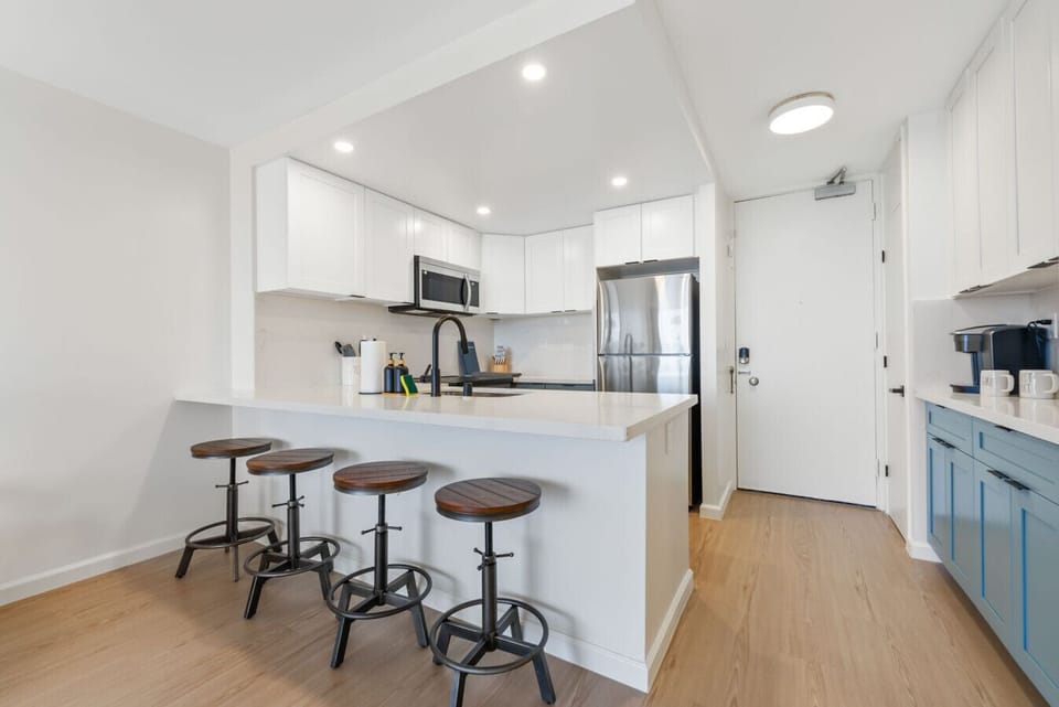 Newly renovated kitchen with brand new appliances, countertops, and fully stocked with pots/pans, dinnerware, and Keurig coffee station
