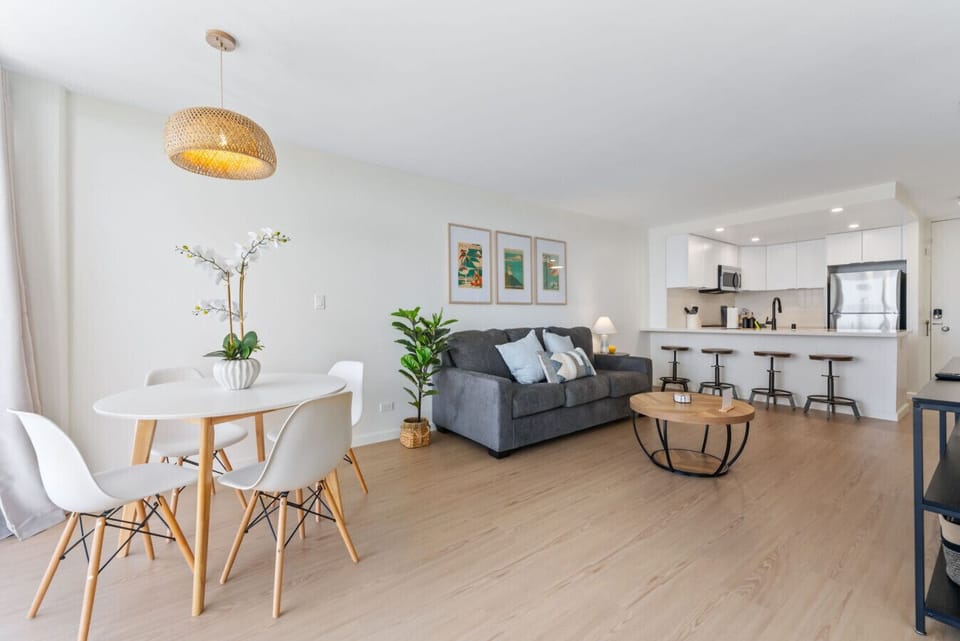 Our bright and airy living room is outfitted with plush Queen sofa sleeper, flatscreen TV, cable + Apple TV.
