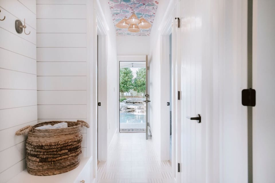From the front door to splash time — this hallway sets the stage for fun.