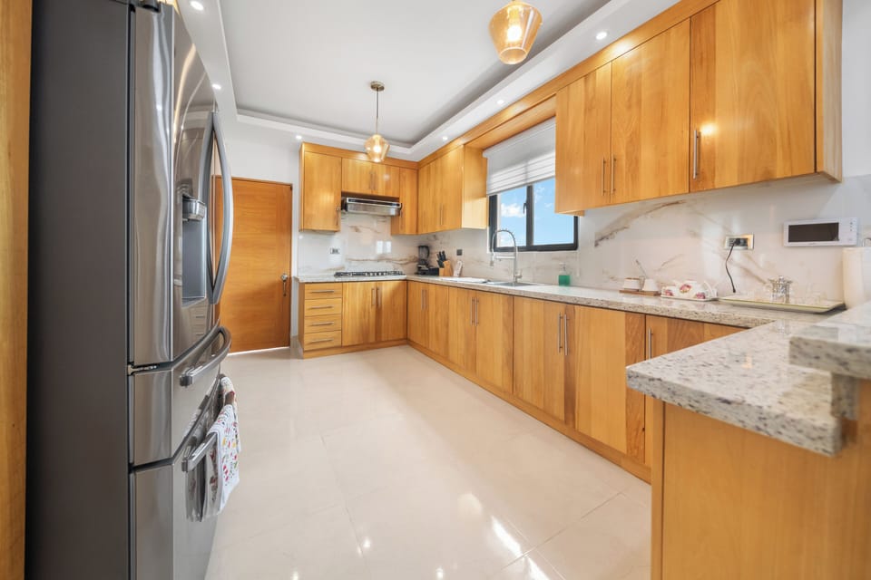 Family Condo, Garden View | Private kitchen | Fridge, microwave, oven, stovetop