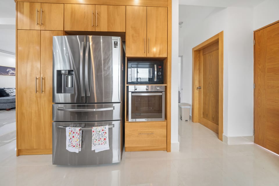 Family Condo, Garden View | Private kitchen | Fridge, microwave, oven, stovetop