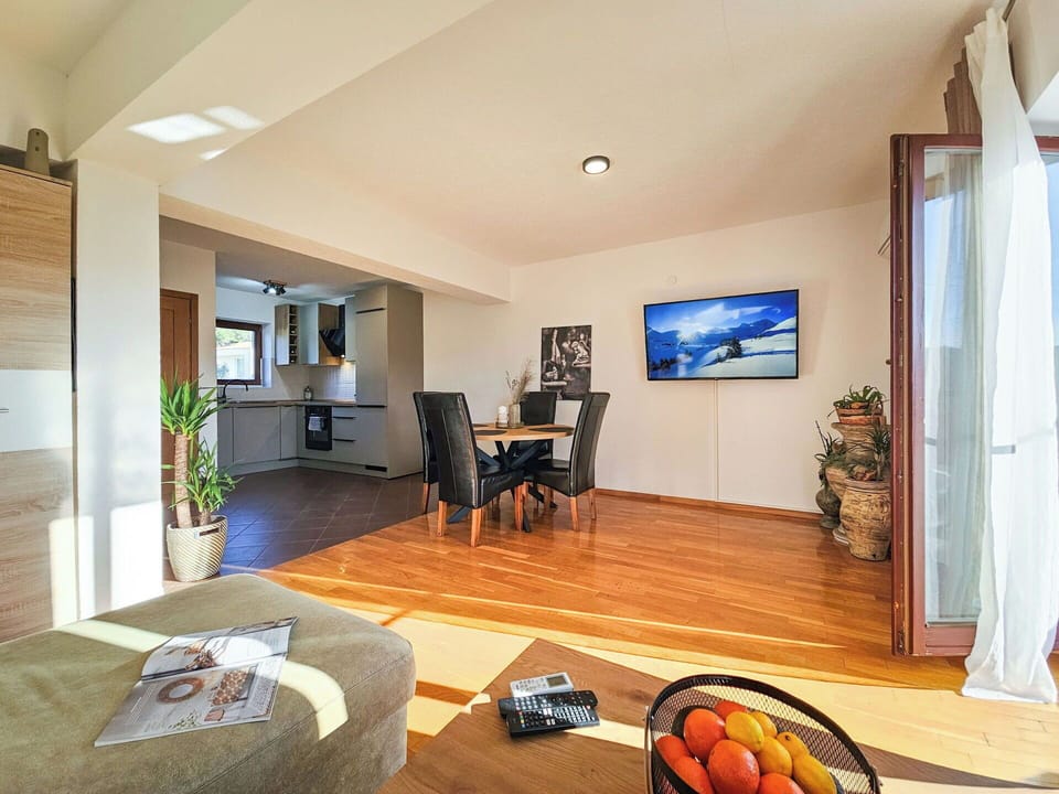 Furniture, Interior Design, Couch, Flooring, Floor, Room, Ceiling, Living Room, Wood, Television
