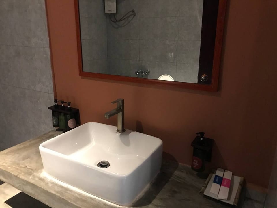 Shower, slippers, towels, soap