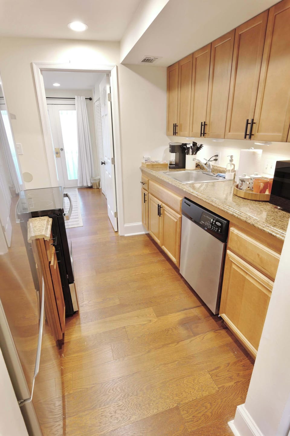 Full size kitchen equipped with modern appliances! 
