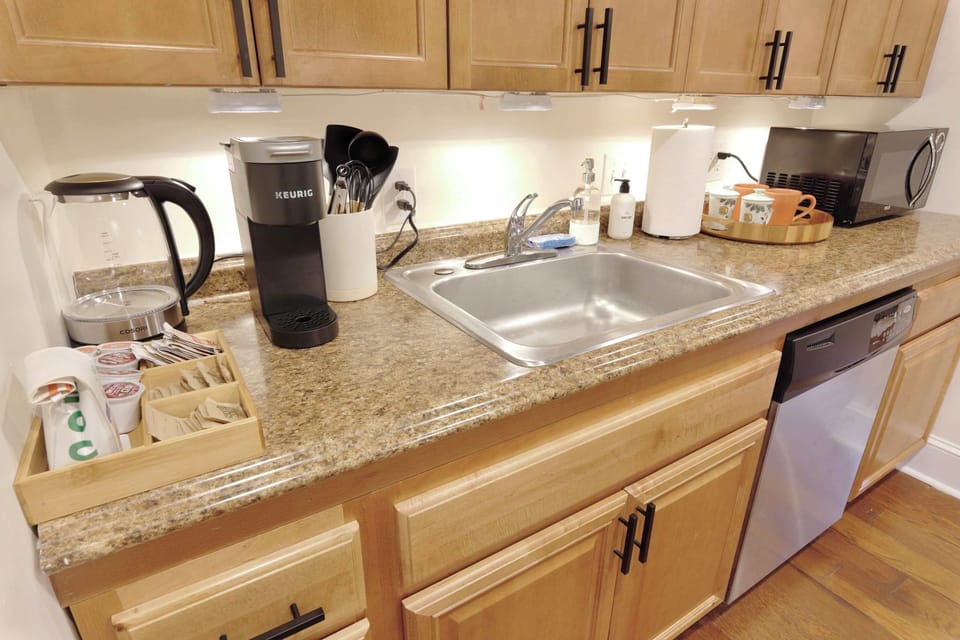 Includes essentials such as coffee pods, tea, cooking utensils, pots and pans! 