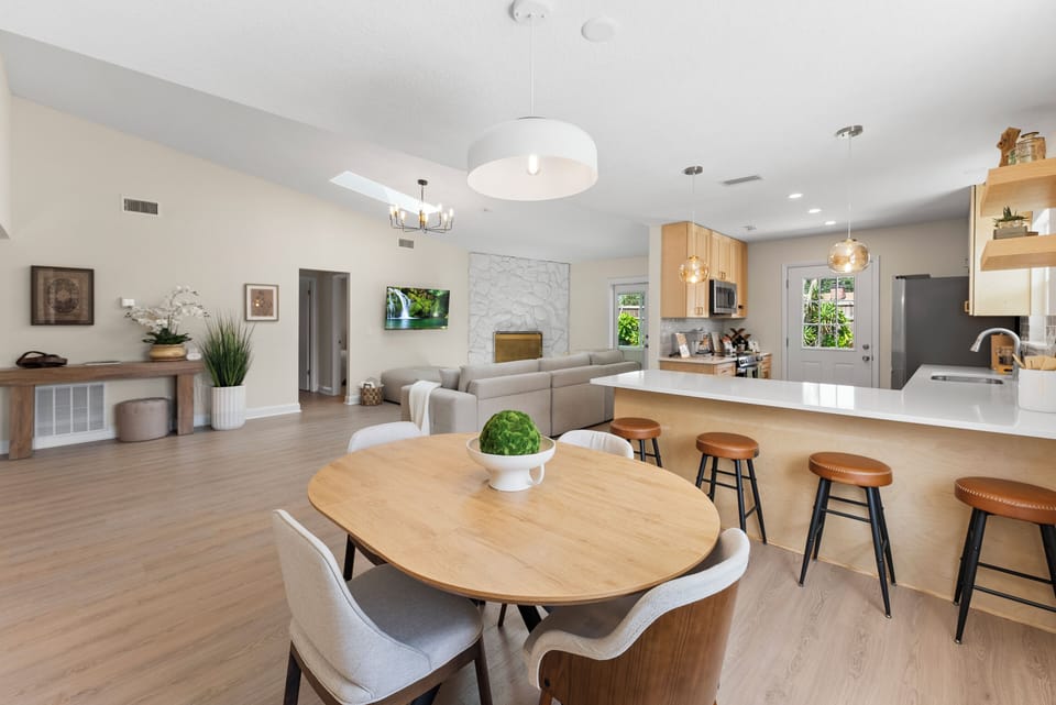Open dining area and island seating—perfect for meals and connection.