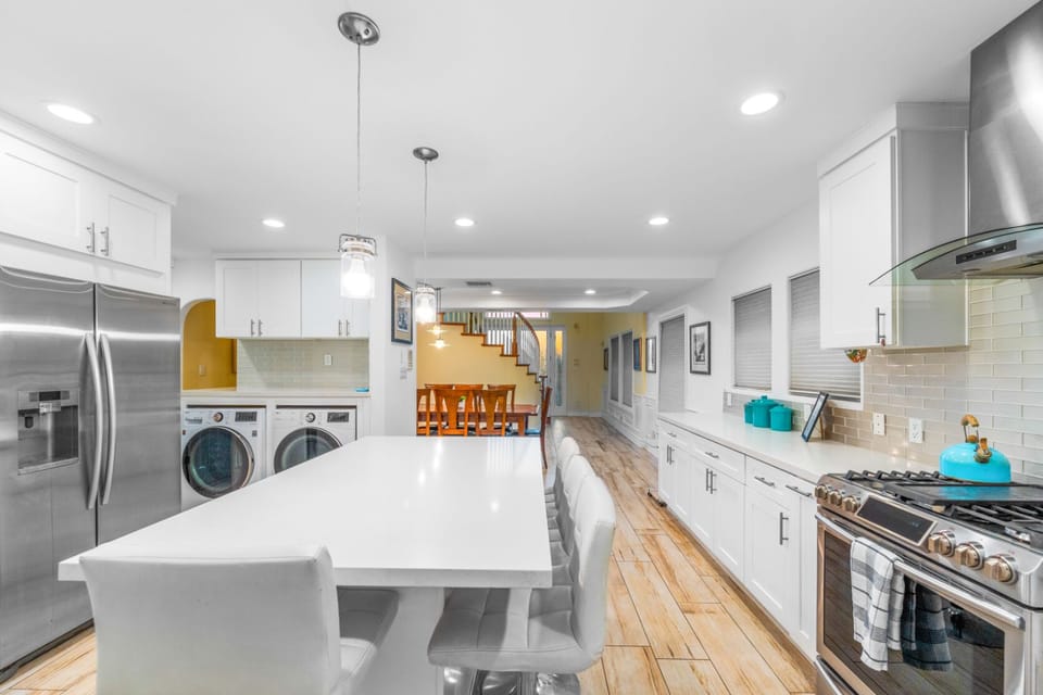 Kitchen is equipped with cooking basics and appliances