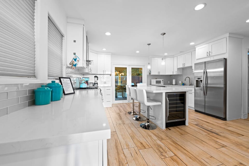 Kitchen also features bar seating for three. 