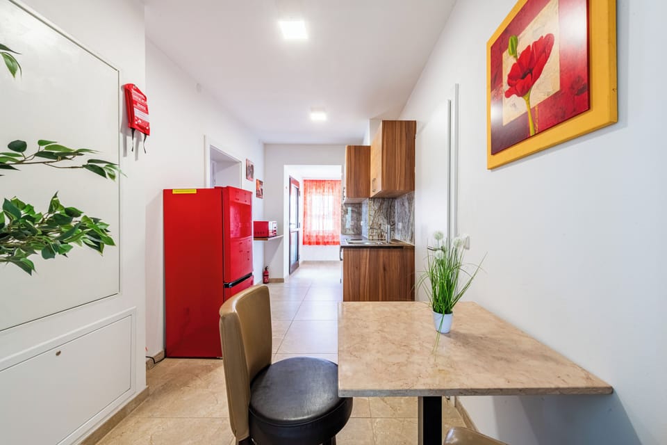 Basic Apartment | Living area | Flat-screen TV