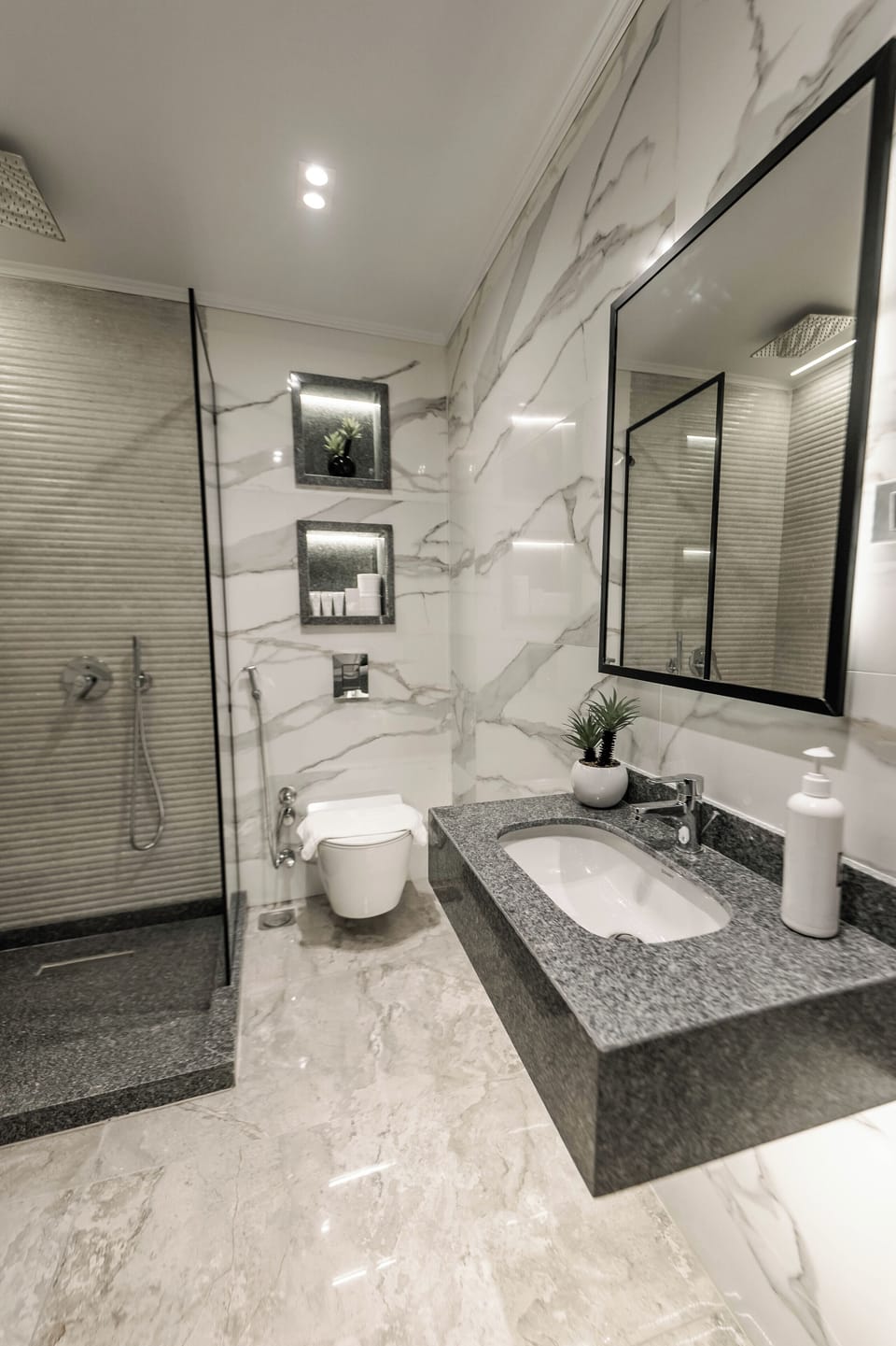 Rainfall showerhead, free toiletries, hair dryer, bathrobes