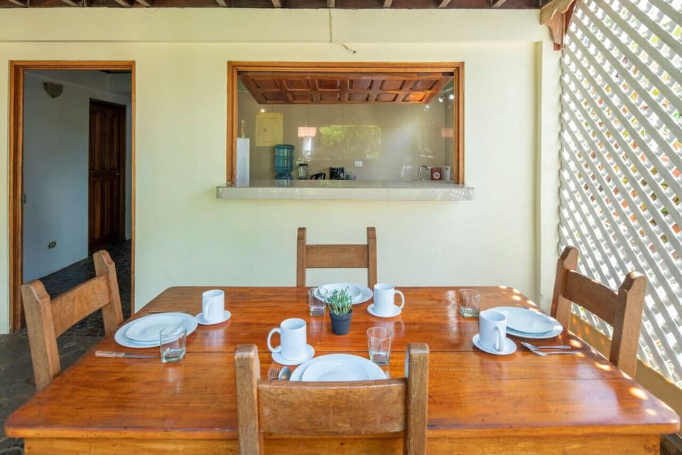 Gather around the table and enjoy meals with a tropical breeze.