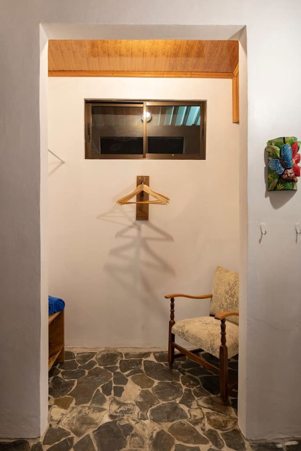 This clean, spacious bathroom 1 features a walk-in shower and a dedicated dressing area, offering everything you need for a refreshing and relaxing experience.