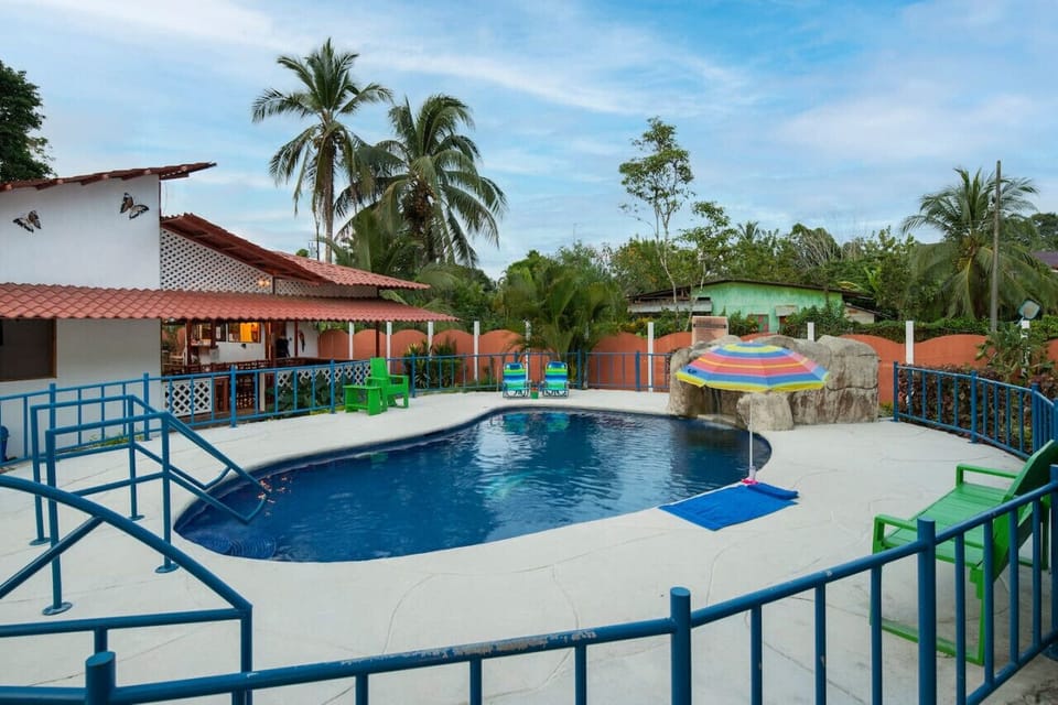 Cool off in the refreshing shared pool, a perfect spot to unwind and enjoy the sunny Costa Rican weather.