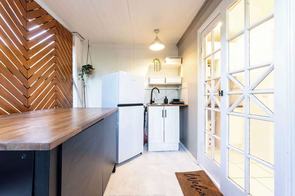 Outdoor Kitchenette with Fridge, Sink and Kitchen supplies