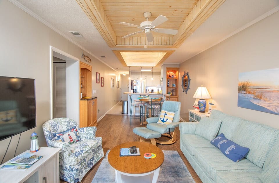 Relax and unwind in this spacious open living area after a fun day at the beach