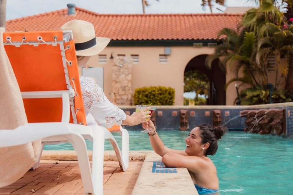 Relaxing in paradise: Cheers to sunny days and refreshing moments by the communal pool at Tierra del Sol!