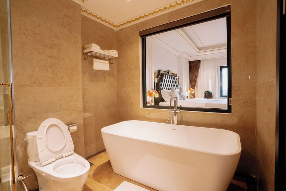 Double Room, City View | Bathroom | Separate tub and shower, free toiletries, hair dryer, slippers