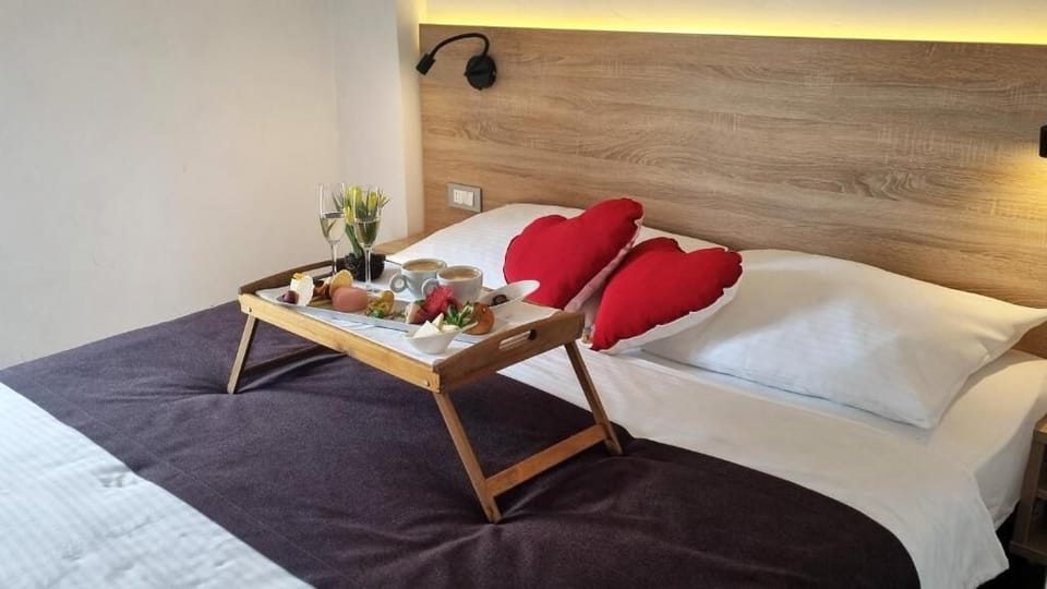 Comfort Double Room, Courtyard View | In-room safe, desk, laptop workspace, soundproofing