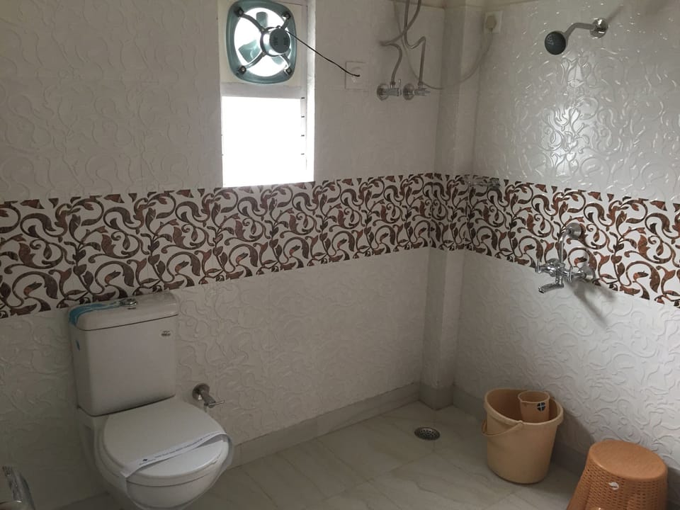 Deluxe Double Room, 1 Bedroom, Garden View, Garden Area | Bathroom | Shower, slippers, towels, soap