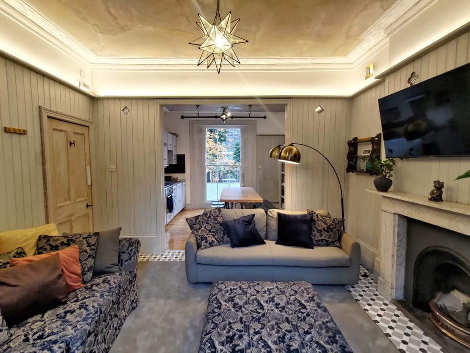 The reception in the evening looking towards the kitchen and dining areas.