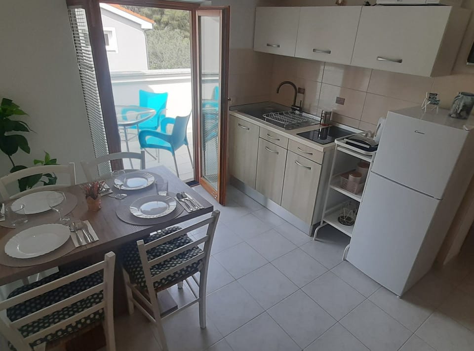 Apartment (One Bedroom Apartment with Balcony an) | Private kitchen | Fridge